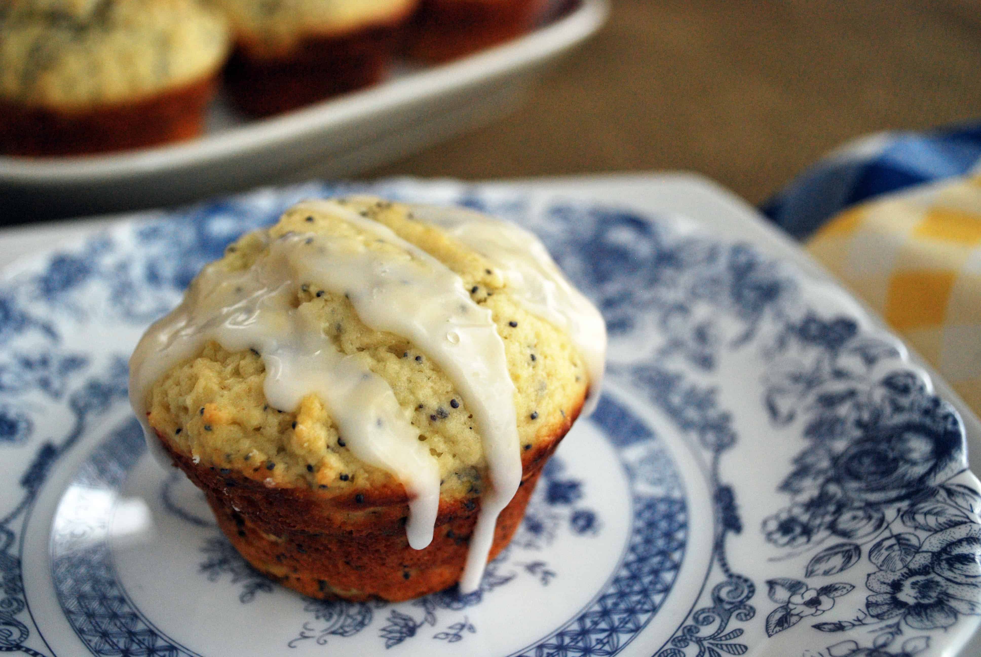 LemonPopyseedMuffinsFG Lemon Poppy Seed Muffin topped with glaze on a blue and white patterned plate