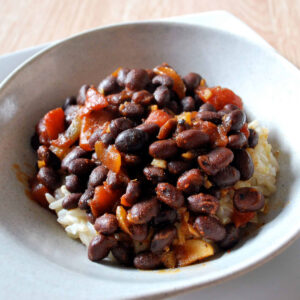 a bowl of beer glazed black beans