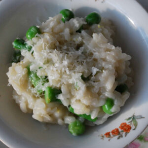 green pea and asparagus risotto in a fancy little bowl.