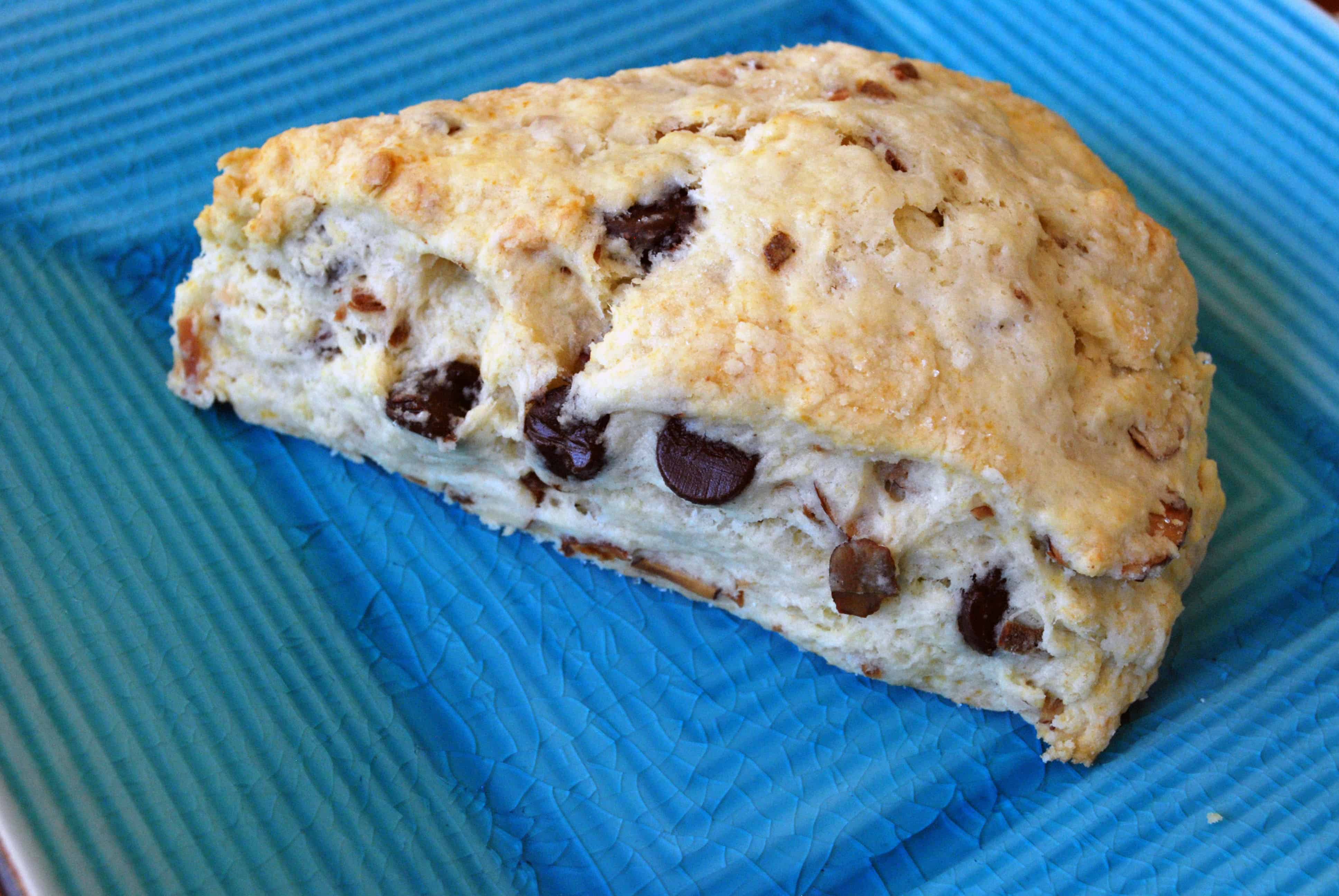 ChocCocSconesCU Chocolate coconut almond scone on a blue plate