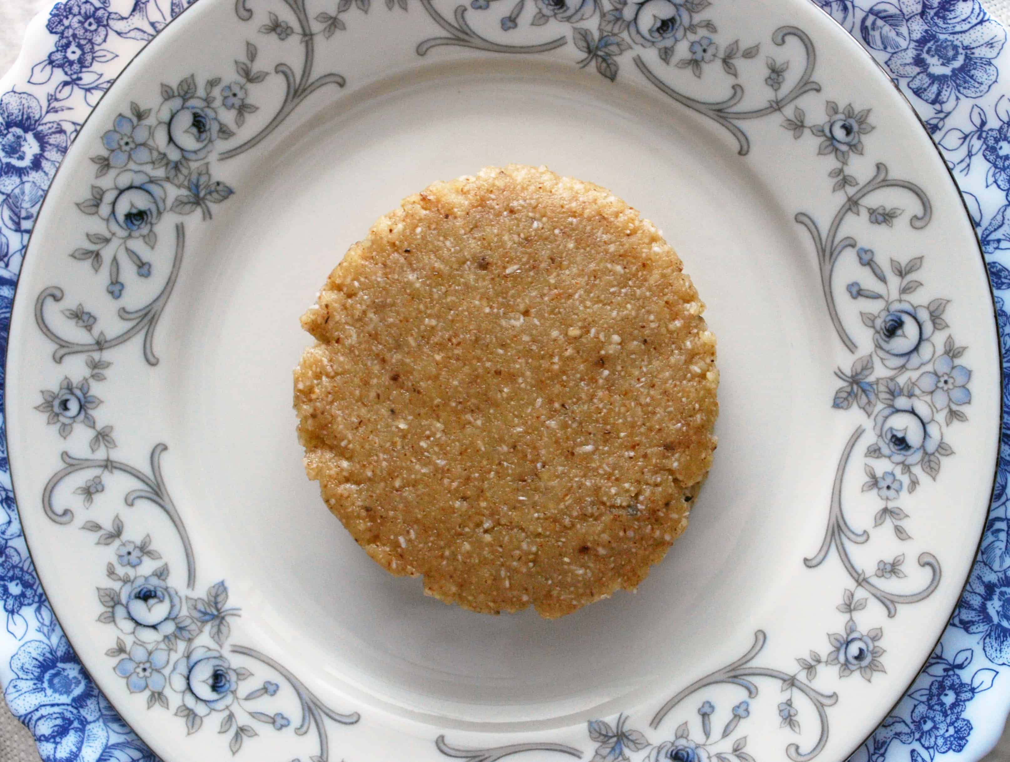 Raw Walnut Shortbread Sandwich Cookies on a plate