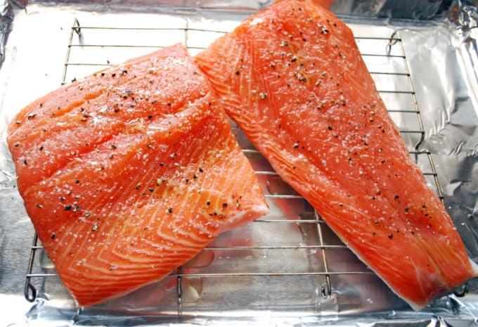 raw salmon on a baking rack