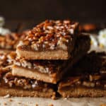 a stack of pecan pie bars