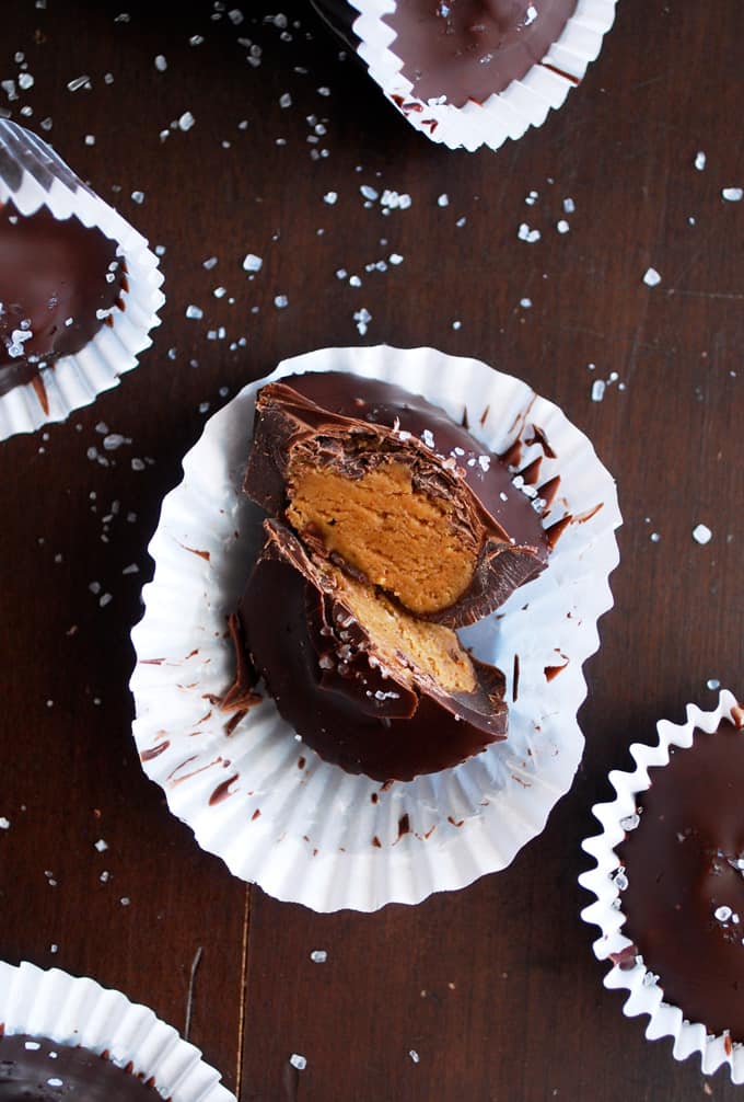 a dark chocolate almond butter cup cut in half