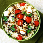 a bowl of caprese couscous
