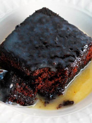 a bowl of chocolate cake and butter sauce