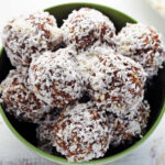 a bowl of coconut snickerdoodle truffles