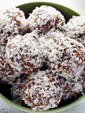 a bowl of coconut snickerdoodle truffles