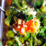 a forkful of broccoli cheddar sweet potato casserole.