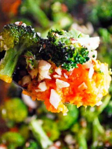a forkful of broccoli cheddar sweet potato casserole.