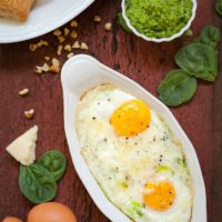 Spinach Pesto Baked Eggs - This is a perfectly balanced meal that is full of flavor! theliveinkitchen.com