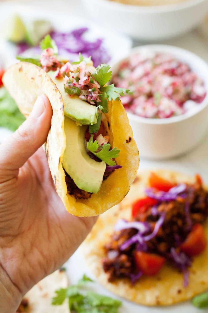 Vegan Tempeh Tacos - These are the ultimate vegan taco! Meaty tempeh, fresh veggies, and crisp shells. I can't stop eating these! 30 minutes, easy and fast! theliveinkitchen.com