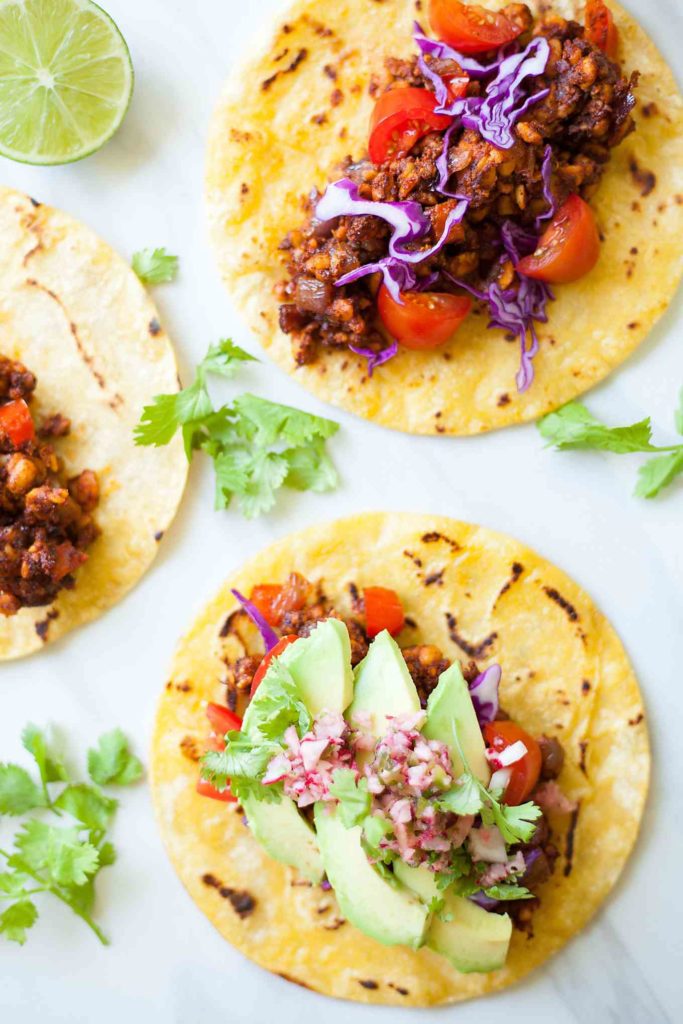 Vegan Tempeh Tacos - These are the ultimate vegan taco! Meaty tempeh, fresh veggies, and crisp shells. I can't stop eating these! 30 minutes, easy and fast! theliveinkitchen.com