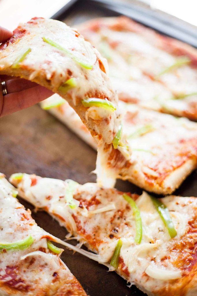 Onion and Green Pepper Pizza - This is always my favorite vegetarian pizza to order at a pizza place, now I can make it at home! theliveinkitchen.com