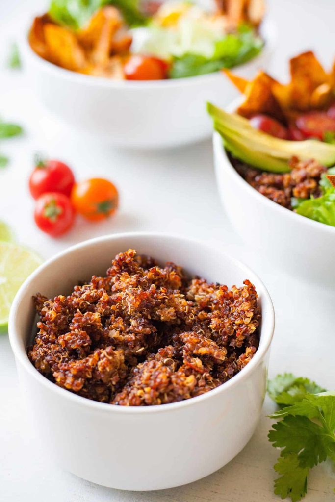 Quinoa Taco Salad - This is the tastiest way to eat all the veggies! This vegetarian bowl is given a spicy kick with the addition of quinoa taco meat! Recipe at theliveinkitchen.com