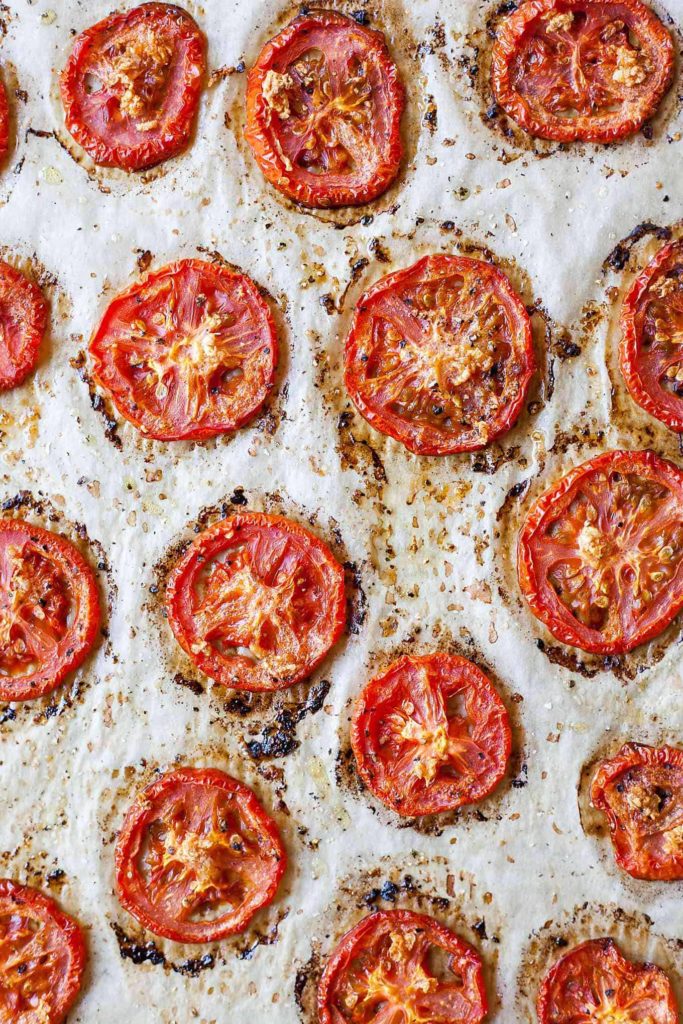 Oven Roasted Tomato and Pesto Panini - This is one of my favorite sandwiches! Fresh pesto, melty cheese, and those slow roasted tomatoes!! I can't get enough of this vegetarian sandwich. Full recipe at theliveinkitchen.com