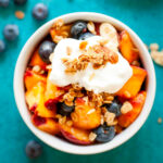 Honey vanilla summer fruit salad in a bowl.