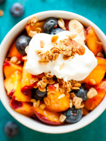 Honey vanilla summer fruit salad in a bowl.