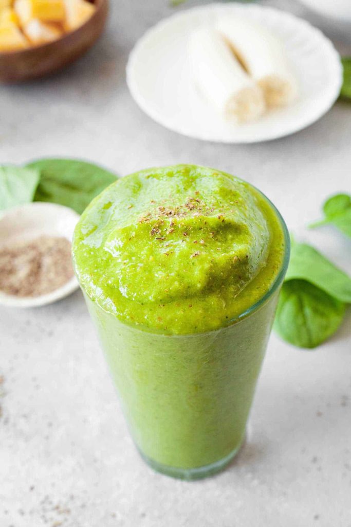 image of tropical green smoothie in glass cup
