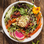 High Protein Fresh Vegan Salad with Hummus in a bowl