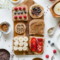 This Almond Butter Toast Bar is a wholesome buffet idea with endless possibilities! Gluten-free and vegan options. #buffet #party #almondbutter #toast #almond #healthy #pretty #easy