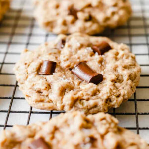 image of oatmeal cookies close up in a row on cooling rack