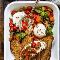 Burrata with Tomatoes, Pesto, and Toast - An easy summer dinner idea that makes the most of your garden fresh produce! #easy #healthy #summer #cheese #tomatoes #burrata #pesto