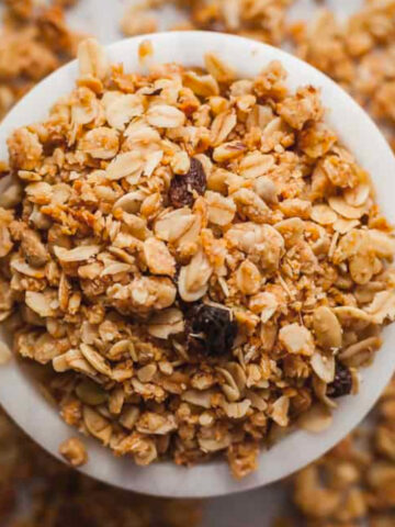 bran granola in a small white bowl.