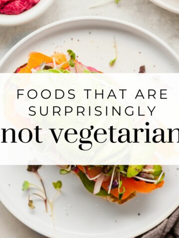 A sandwich with text overlay "foods that are surprisingly not vegetarian".