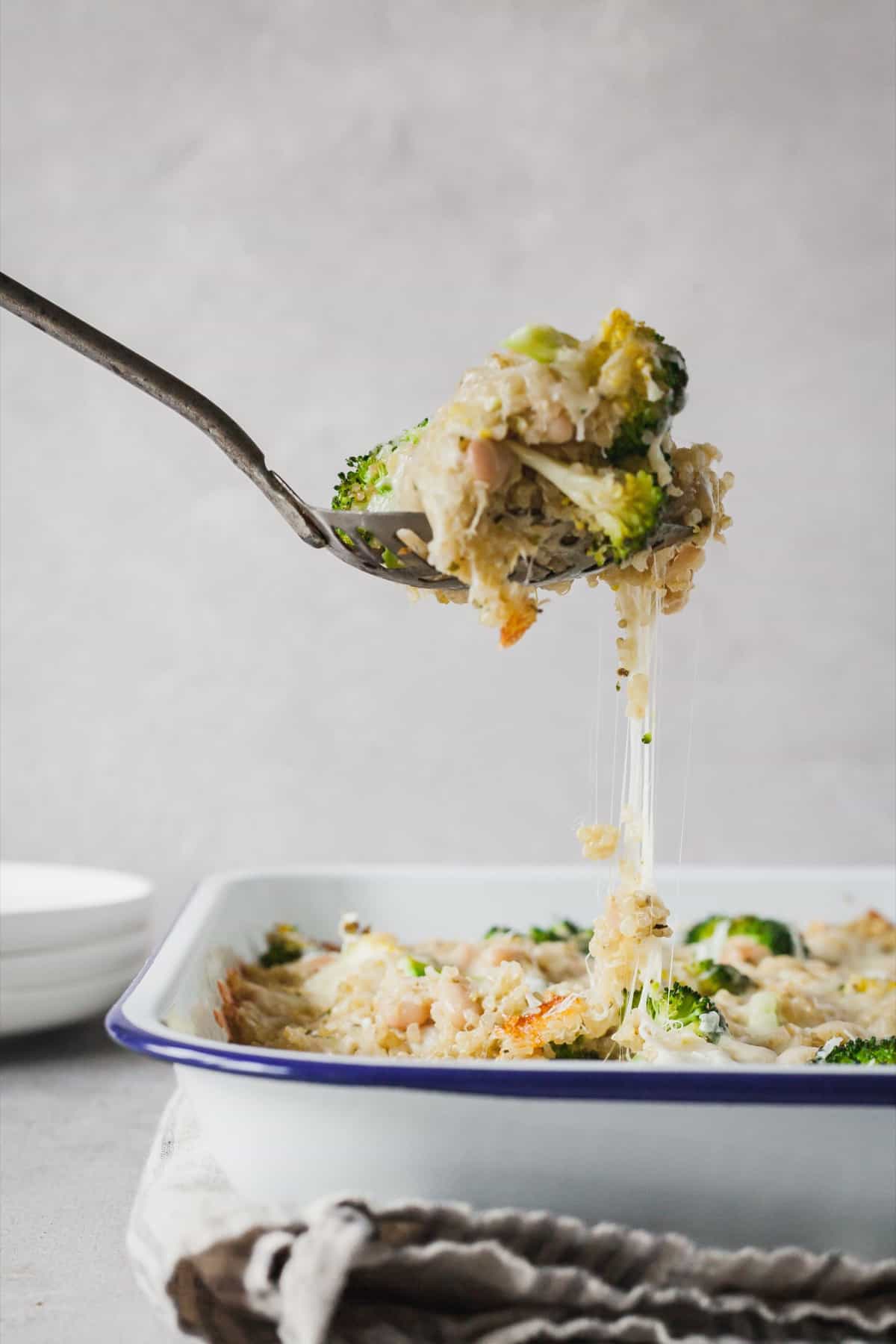 fork lifing broccoli quinoa casserole