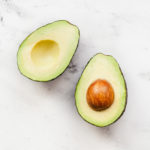 one ripe avocado cut in half
