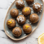 a plate of lemon poppy seed protein balls
