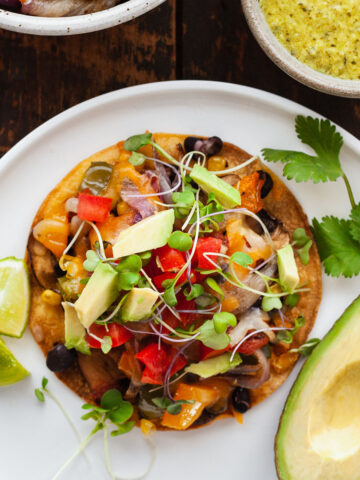 featured image of roasted veggie tostada on white plate