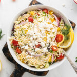 a bowl of greek orzo salad