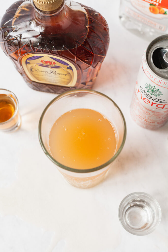 a vegas bomb drink on a marble counter with other drinks around