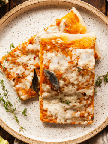 two rectangle slices of pumpkin pizza on a plate