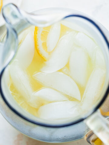 Top down view of a pitcher of lemonade.