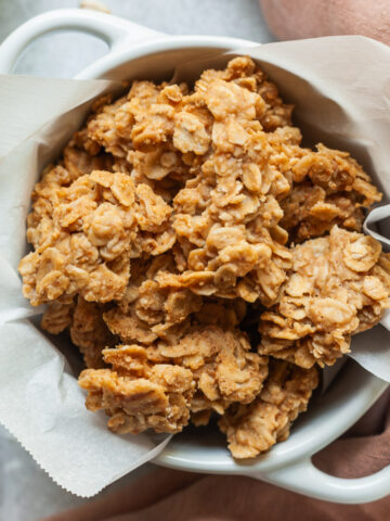 A small bowl full of chewy peanut butter bites.