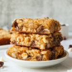 A stack of three congo bars on a white plate.