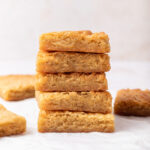 A stack of 5 butterscotch bars.