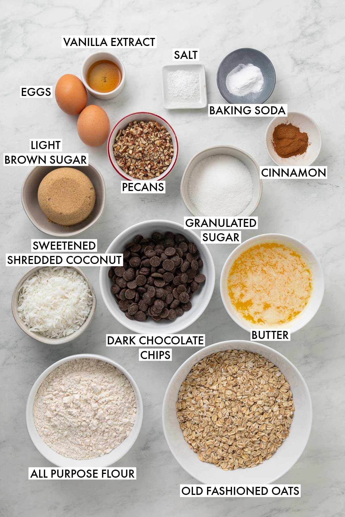 Ingredients used to make coconut oatmeal chocolate chip cookies.