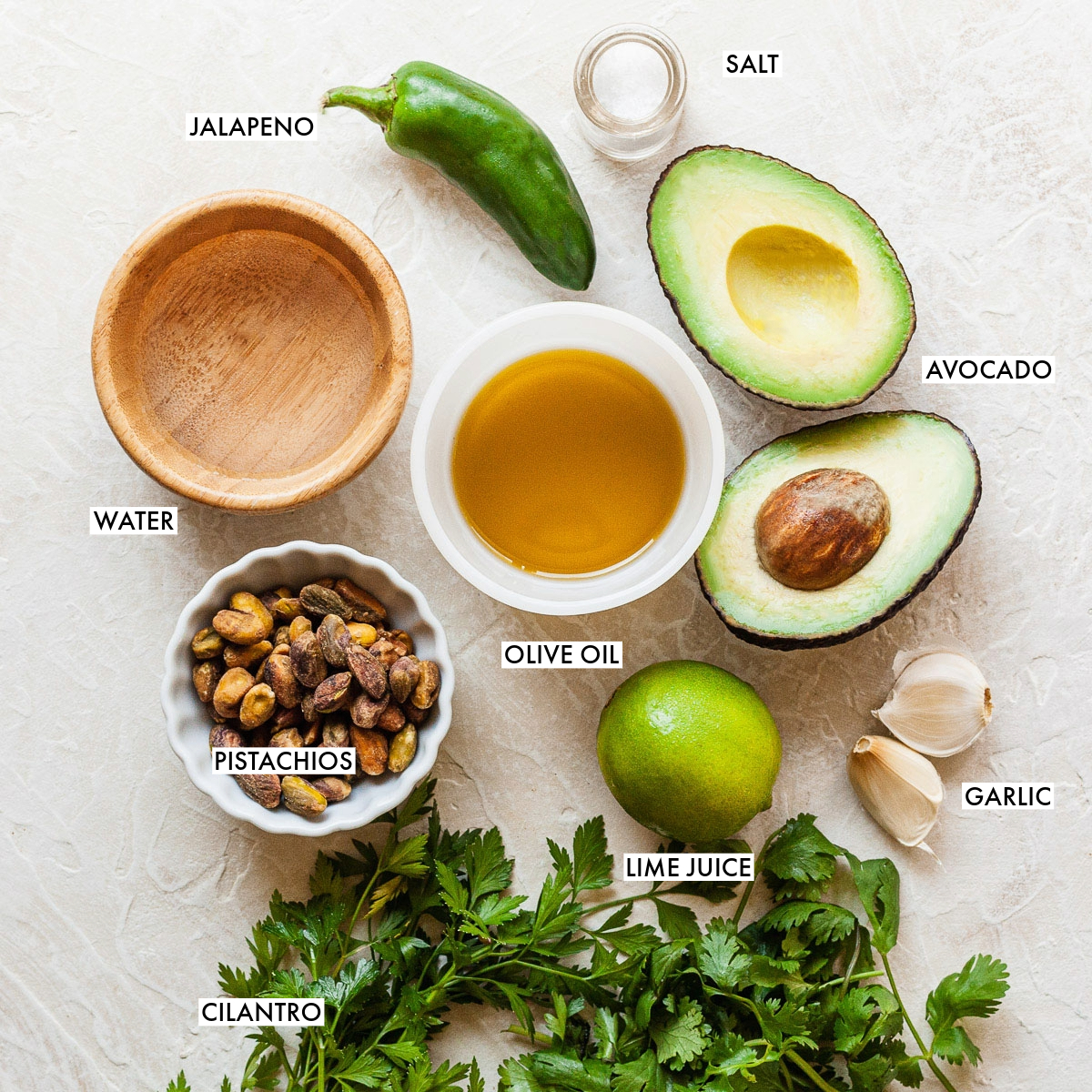 Ingredients used to make green avocado sauce.
