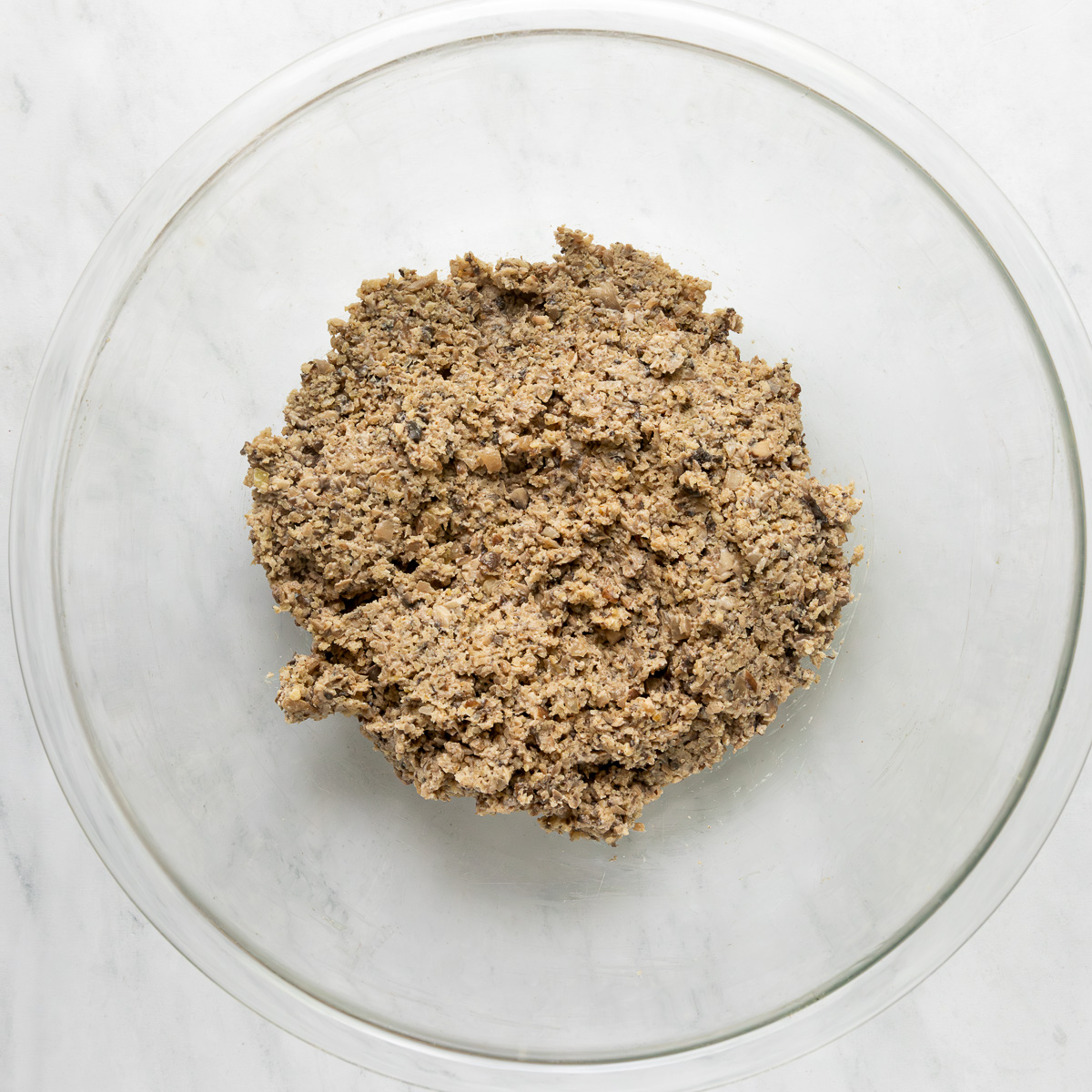 Walnut burger patty mixture in a bowl.