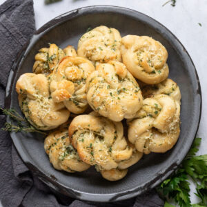 A plate of garlic parmesan knots.