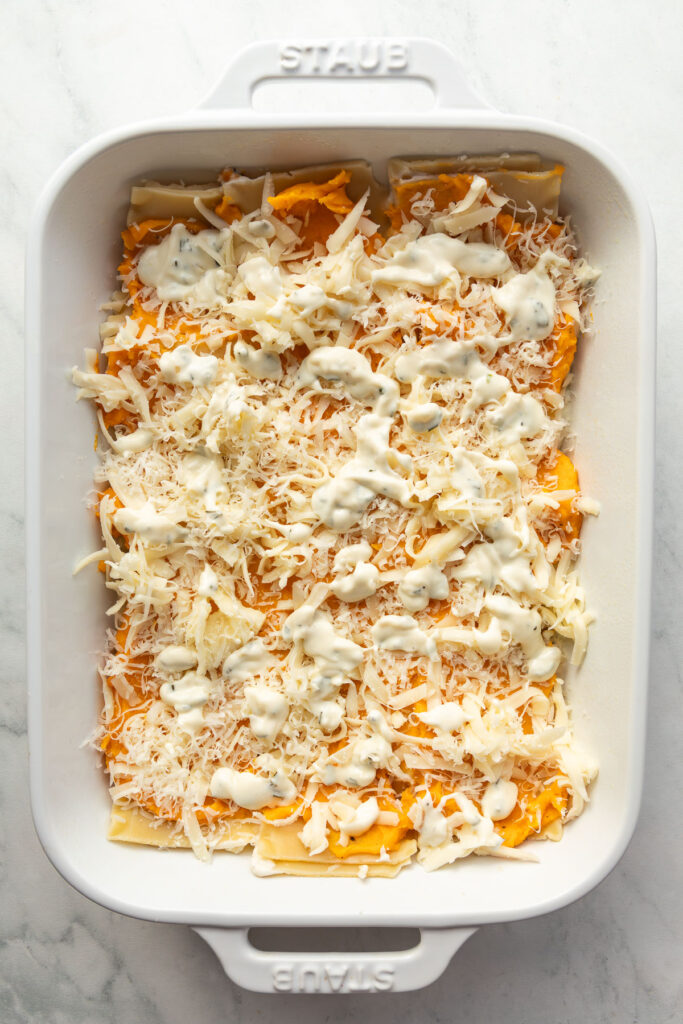In progress shot of layers of a butternut squash lasagna.