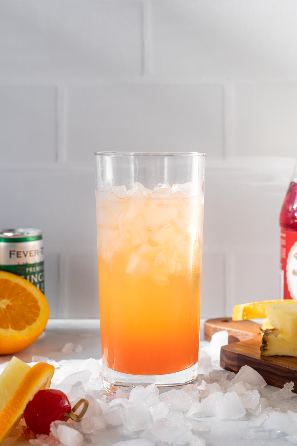 Cinderella mocktail in a glass surrounded by crushed ice