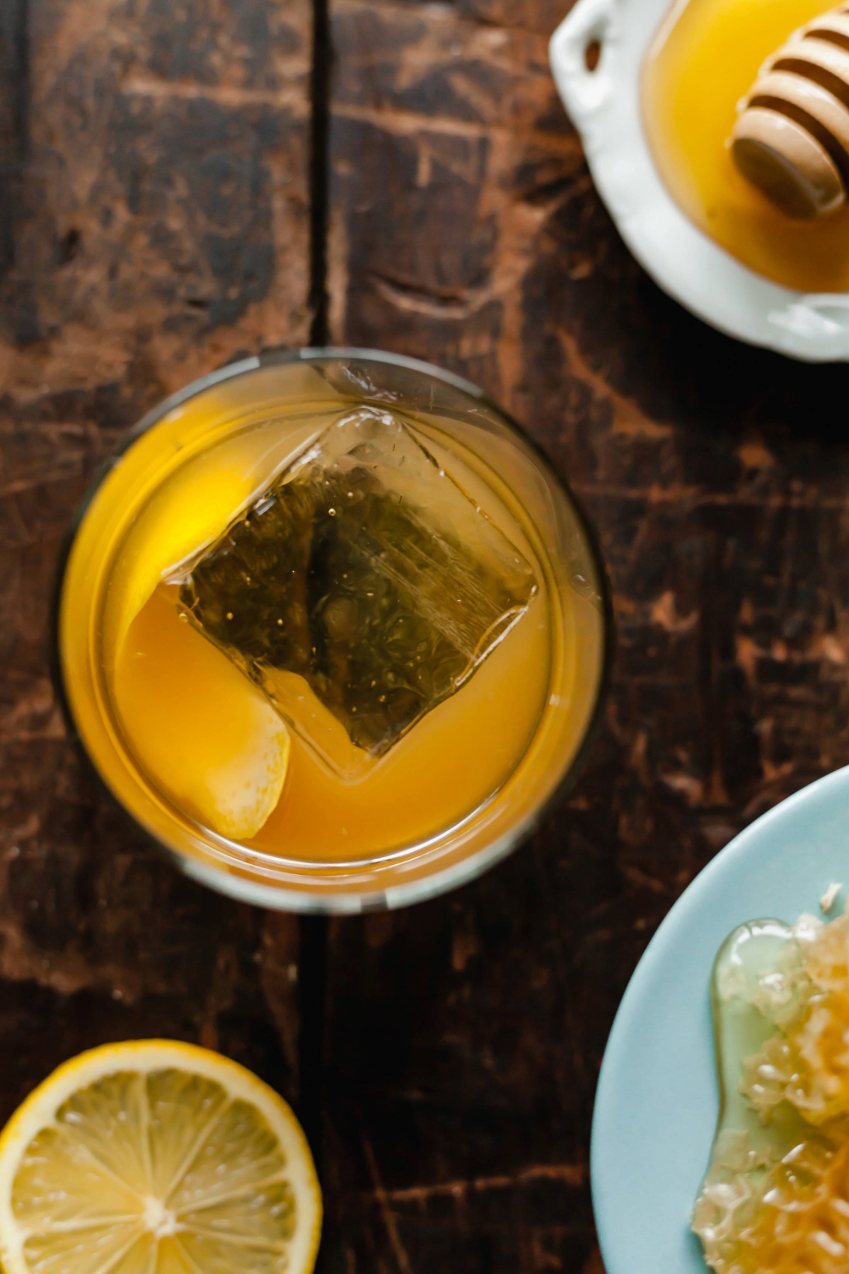 Top down view of a gold rush cocktail in a glass.