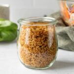 Crispy quinoa in a small jar.