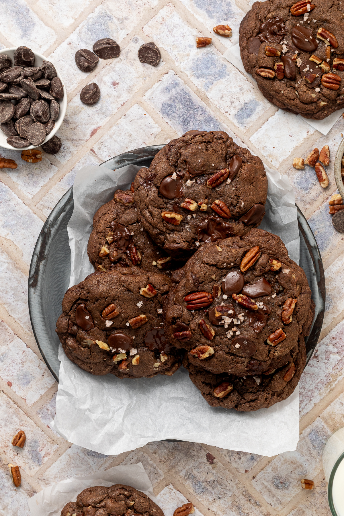 A platter full of double chocolate chip cookies.