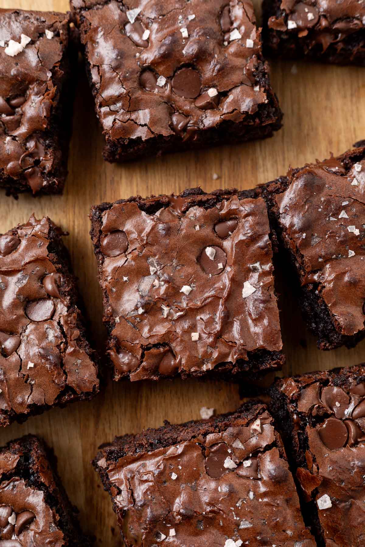 Chewy molasses brownies sliced on a cutting board.